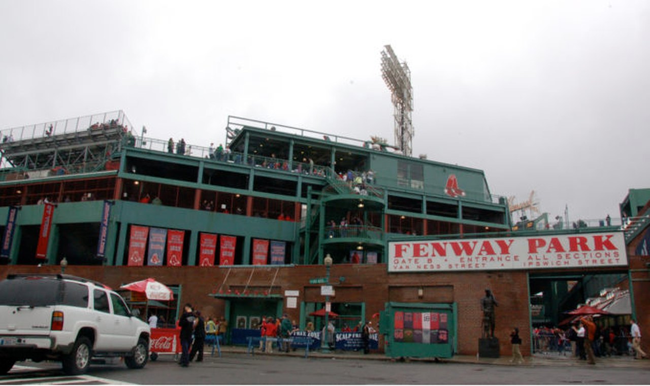 The Fascinating History (& Secrets) of Fenway Park's Iconic Green Monster  - FanBuzz