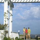 Thinkstock/Comstock/Getty Images Pergolas are a place for stopping and enjoying the outdoor environment.