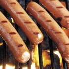 Jupiterimages/liquidlibrary/Getty Images Processed meats like hot dogs can be a source of free radicals.