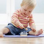 Polka Dot/Polka Dot/Getty Images Playing helps your baby learn important concepts, such as cause and effect.