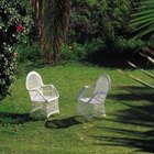 John Foxx/Stockbyte/Getty Images Furniture and other objects on the lawn can cause bald spots.