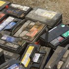 Jupiterimages/Photos.com/Getty Images Storing old batteries on your garage floor is asking for trouble.