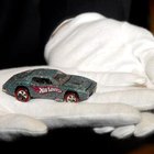 Rob Loud/Getty Images Entertainment/Getty Images Create swappable car finials with hook-and-loop tape.