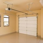 Jupiterimages/Comstock/Getty Images Change the tire on a garage floor or other level surface.
