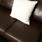 Jupiterimages/Photos.com/Getty Images Repairing small holes in leather is easy if you have the right tools.