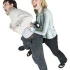 Hemera Technologies/PhotoObjects.net/Getty Images Combine humor with affectionate gestures to reduce feeling uncomfortable.