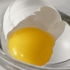 Jupiterimages/liquidlibrary/Getty Images Intact eggshells naturally prevent bacteria from entering and spoiling eggs.