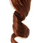 Thomas Northcut/Digital Vision/Getty Images Synthetic fibers melt under the high heat of curling irons and dryers.