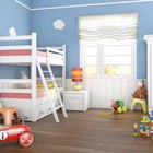 arquiplay77/iStock/Getty Images Storage cubicles help to separate your twins' toys and personal items.