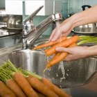 Adam Gault/Digital Vision/Getty Images Use the smallest amount of water to minimize nutrient loss.