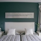Digital Vision./Digital Vision/Getty Images Push two beds very close together to free up floor space for other activities.