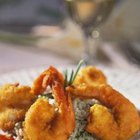 Medioimages/Photodisc/Photodisc/Getty Images Baking shrimp instead of frying can still yield crispy results.