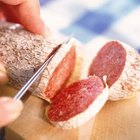 John Foxx/Stockbyte/Getty Images Dry salami varieties keep well until they're cut.