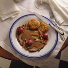 Jupiterimages/Comstock/Getty Images Pot roast can be seasoned with a variety of spices and herbs.