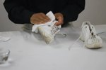 can you put leather jordans in the washing machine
