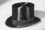 Mad Hatter Hat To make this super-hip hat, you only need one thing: A large piece of paper! For an adult sized hat, cut a piece of packing paper down to a 18