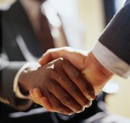 Duncan Smith/Photodisc/Getty Images Changing a partnership to an LLC in Michigan is primarily a matter of paperwork.