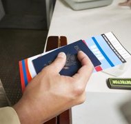 Digital Vision./Photodisc/Getty Images Airport or immigration officials generally need to see a child’s travel documents.
