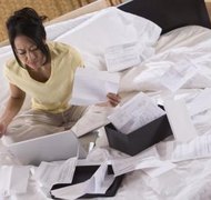 Comstock Images/Comstock/Getty Images A transfer of title will be necessary to complete home ownership.