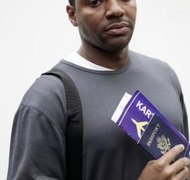 Creatas/Creatas/Getty Images Failing to pay child support could result in the restriction of your passport.