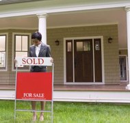 David Sacks/Lifesize/Getty Images Real estate may be owned and sold by a trust.