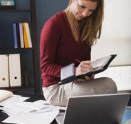 Jupiterimages/Comstock/Getty Images File articles of organization with the state to form an Ohio LLC.