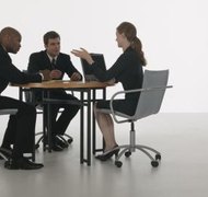 Comstock Images/Comstock/Getty Images A case manager may help the couple reach an agreement.