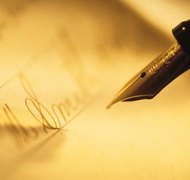 Comstock/Comstock/Getty Images A principal may authorize his attorney-in-fact to sign contracts on his behalf.