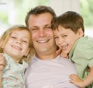 BananaStock/BananaStock/Getty Images A custodial parent usually has primary physical custody of the children.