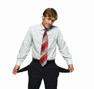 George Doyle/Stockbyte/Getty Images If your spouse files for bankruptcy, you may be on the hook for your joint debts after the divorce.