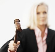 Stockbyte/Stockbyte/Getty Images Bankruptcy judges impose penalties for fraud.