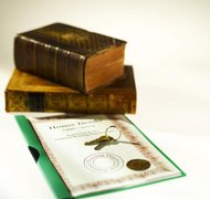 Stockbyte/Stockbyte/Getty Images The deed must contain a location and description of the property.