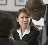Comstock Images/Comstock/Getty Images Mediators guide negotiations toward an agreement.