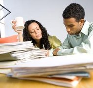 Photos.com/Photos.com/Getty Images Forming a business requires paperwork.
