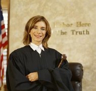 Stockbyte/Stockbyte/Getty Images Probate judges issue orders empowering executors to administer estates.