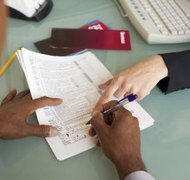Creatas/Creatas/Getty Images Make sure you qualify before changing your name.