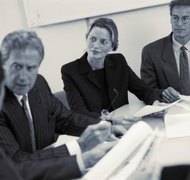 BananaStock/BananaStock/Getty Images A court-appointed trustee sets up the repayment plan in a Chapter 13 bankruptcy.