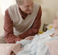 Comstock Images/Stockbyte/Getty Images A Medicaid divorce ends the marriage legally, but not the relationship.
