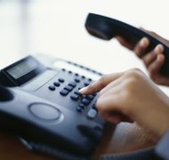 Ciaran Griffin/Stockbyte/Getty Images An executor pays a deceased's bills during probate.