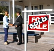 George Doyle/Stockbyte/Getty Images The former marital residence is often a separating couple's largest asset.
