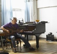 John Howard/Digital Vision/Getty Images Often, the composer of a song is not the actual copyright owner.