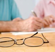 Photos.com/Photos.com/Getty Images If you reach a property agreement, the court usually approves it.