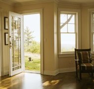 Jupiterimages/Creatas/Getty Images A divorcing spouse may decide to keep the marital residence.