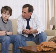 Jupiterimages/Comstock/Getty Images Deported fathers can lose their legal rights to their children.
