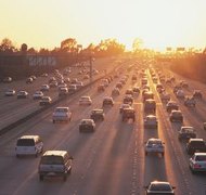 Digital Vision./Photodisc/Getty Images LLCs and corporations can own cars, the same as any other legal entity.