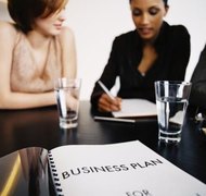 George Doyle/Stockbyte/Getty Images A business plan serves as a comprehenisve guide.