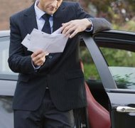Jupiterimages/BananaStock/Getty Images A process server can hand-deliver divorce papers to your spouse.