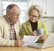 Creatas Images/Creatas/Getty Images An agent may sign documents for the principal, who authorizes the power of attorney.
