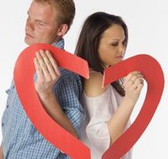 Jupiterimages/liquidlibrary/Getty Images The law doesn't require separate divorce attorneys.