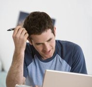 Jupiterimages/Comstock/Getty Images Remarriage before you're divorced could result in a void marriage.